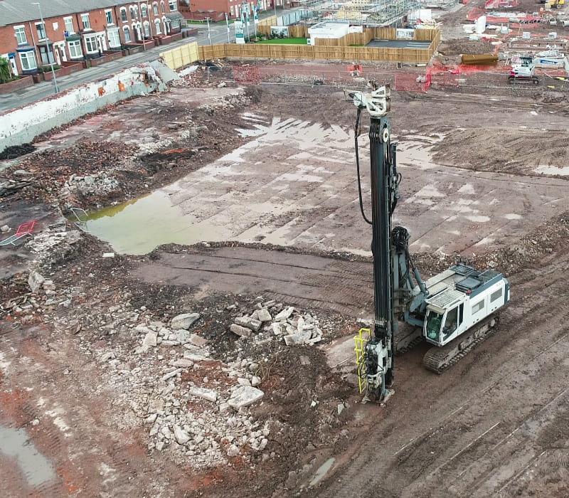 Vibro stone column foundation installed at brownfield site, achieving 95% end-product compaction.