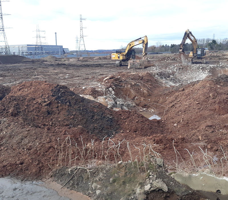 McAuliffe’s earthworks and enabling works team on site, stripping out topsoil and stabilising contaminated soils for reuse on site.