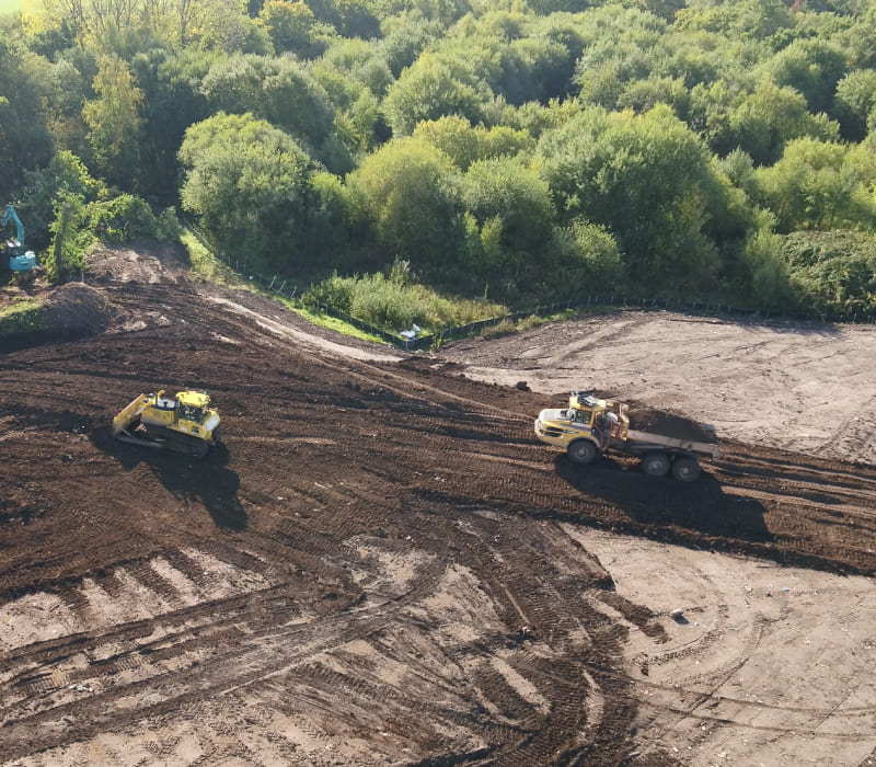 Yellow remediation equipment in use by McAullife to safely reuse 29,439m2 of material.